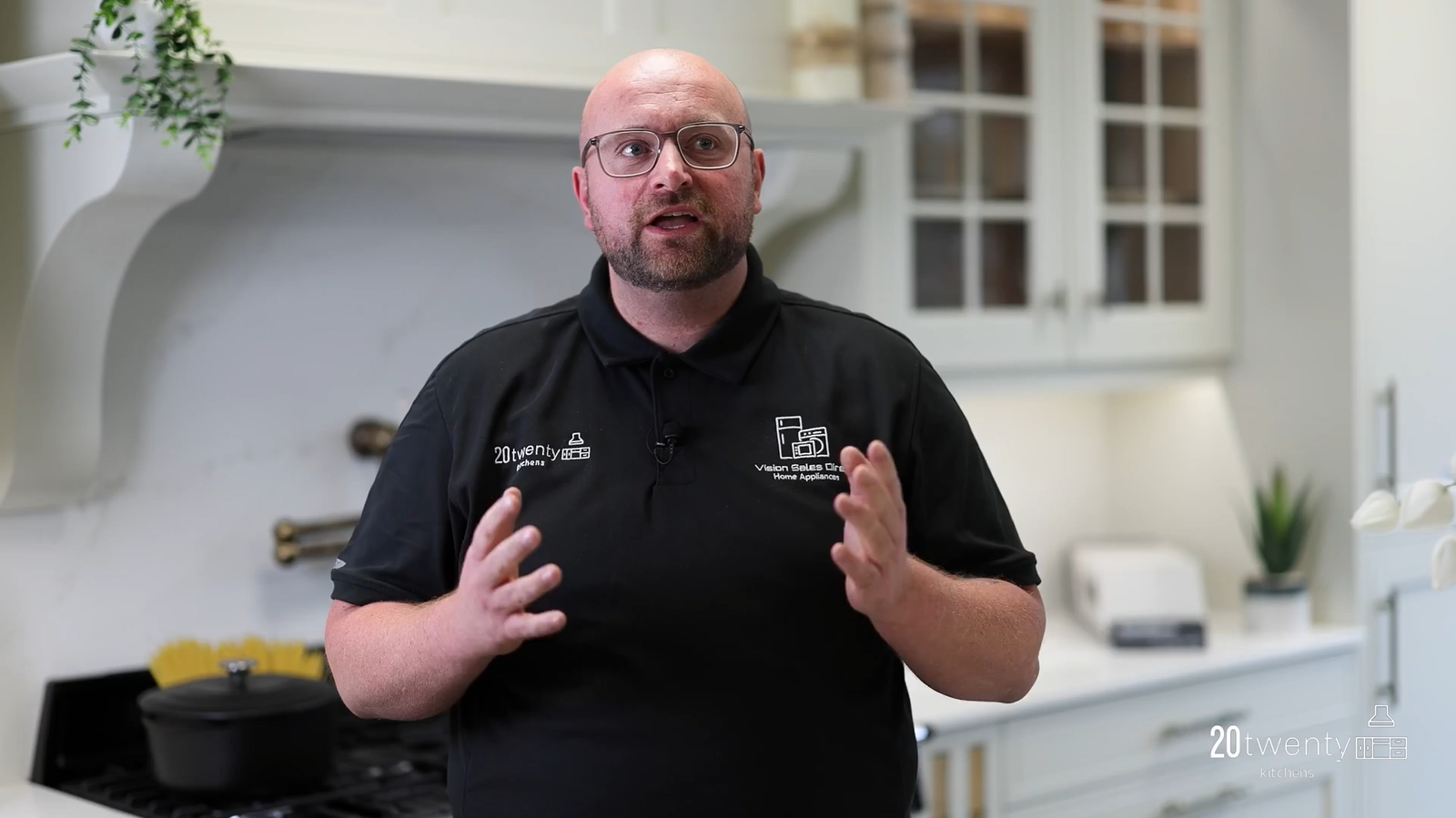 Jordan from 20Twenty Kitchens speaking inside the showroom